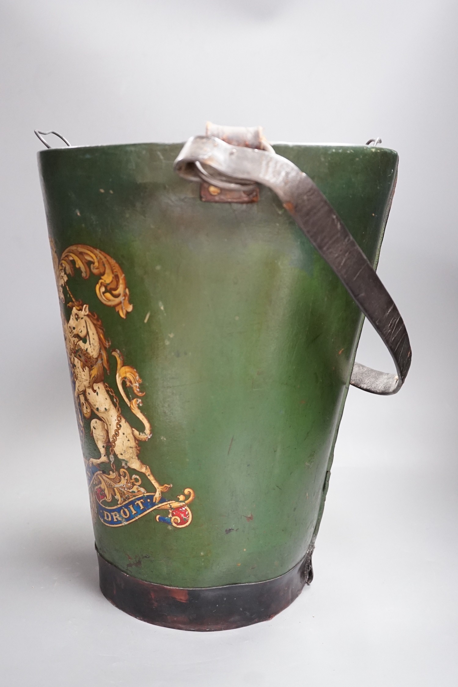 A green painted leather fire bucket with metal liner, 38cm